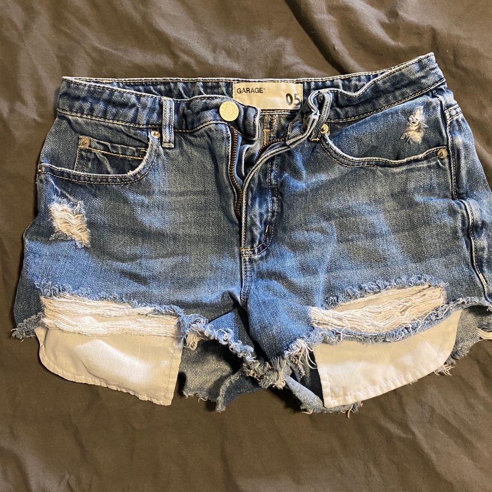 Distressed blue Jean shorts